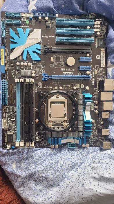 Продам материнскую Asus P7p550 процессор и боксовый кулер