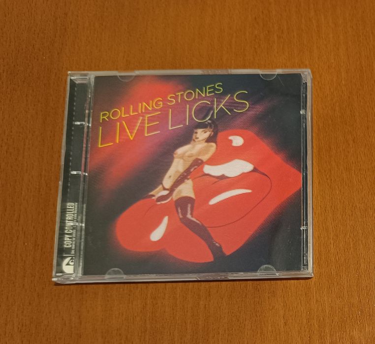 CD de Rolling Stones e SuperHeavy como Novos.