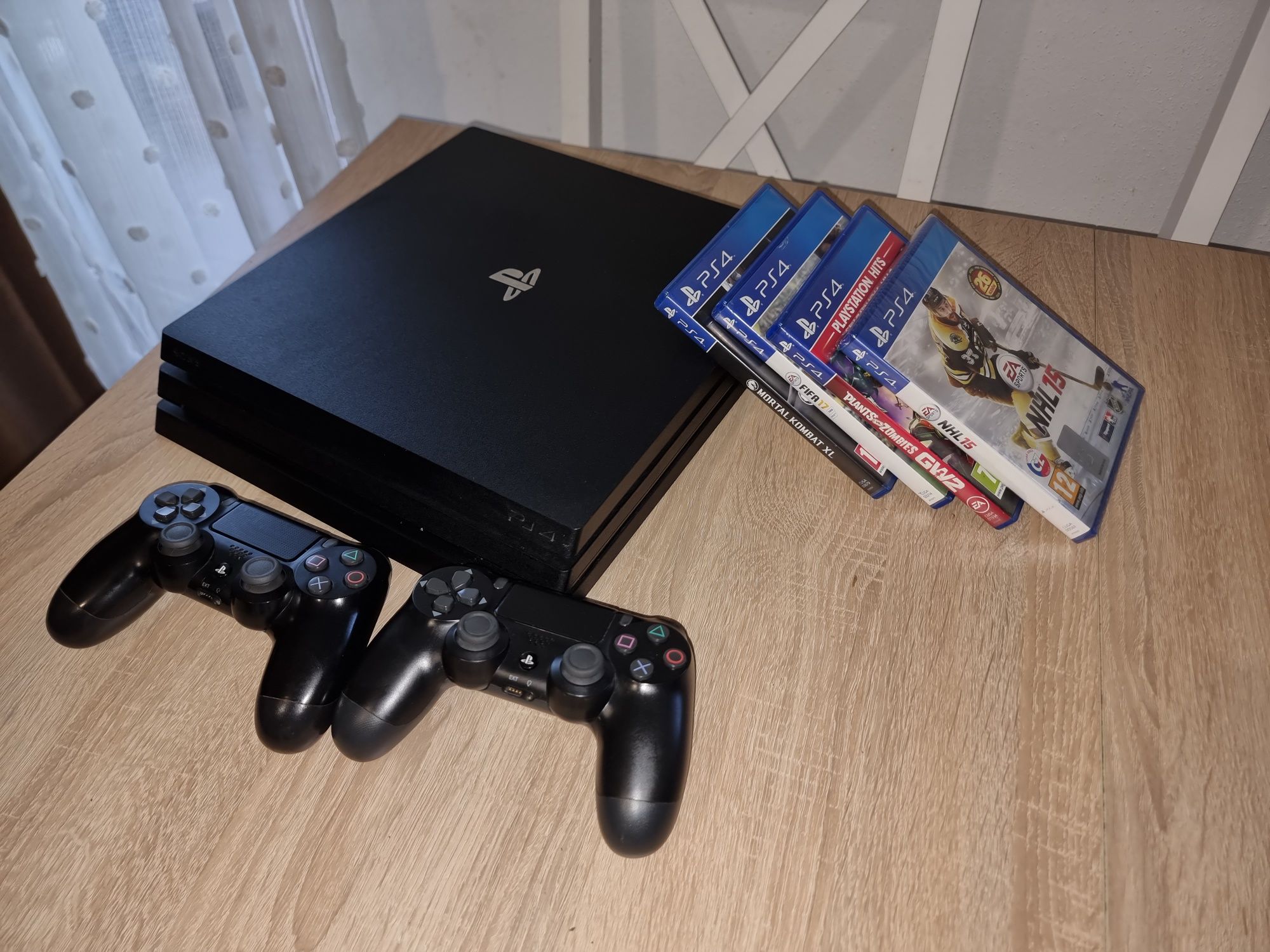 Ps4 2 pady 6 gier Łowicz • OLX.pl