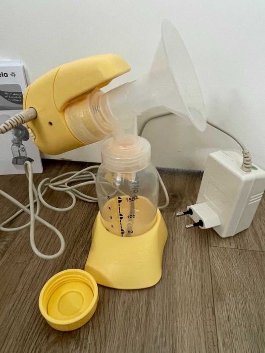 Extrator de leite MEDELA mini eletric com vários acessórios