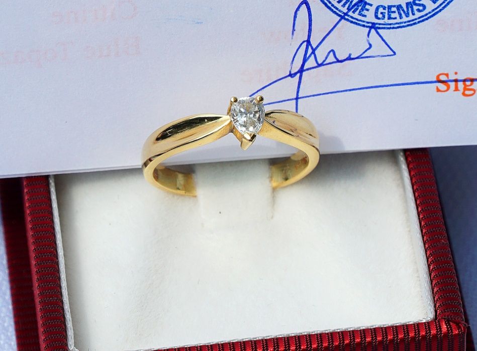 Pierścionek z brylantem 18K(ct) próba 750 brylant-0.33 ct