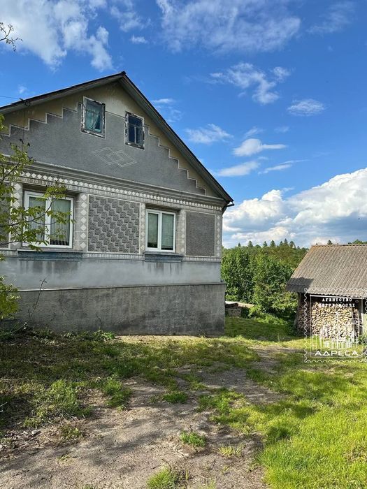 Продаж будинку з земельною ділянкою