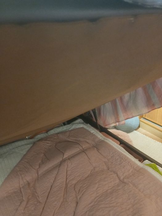 Cama com arrumação