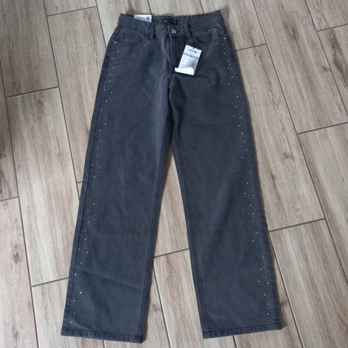 Damskie spodnie jeans  z szerokimi nogawkami-M