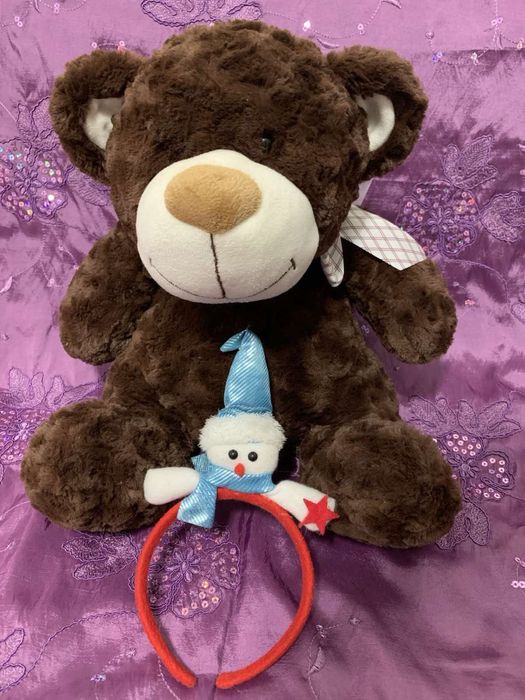 Мʼяка  іграшка ведмідь