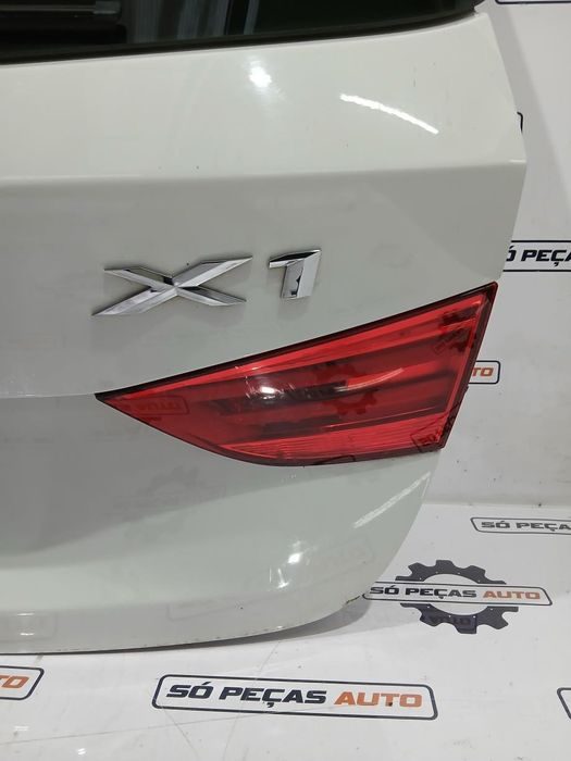 FAROLIM DIREITO BRANCO BMW X1 2.0D E84 ANO: 2010