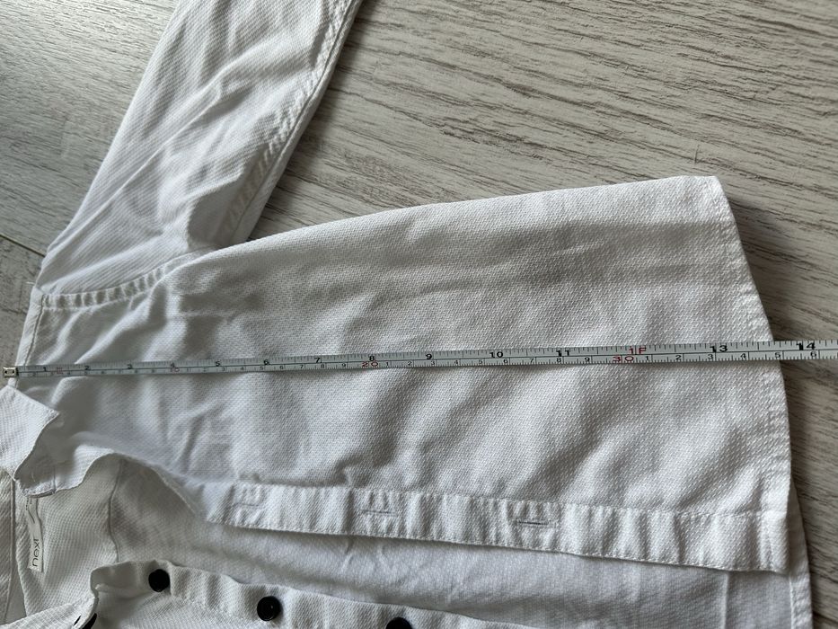 Біла сорочка next