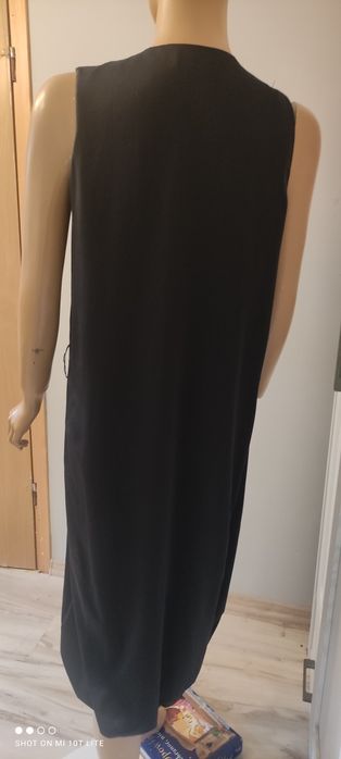 Sukienka elegancka czarna kopertowa od góry do dołu