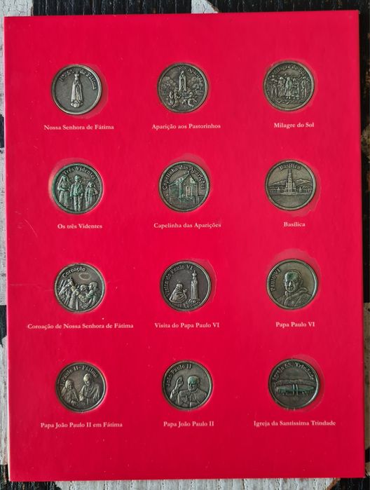 Várias medalhas do Diário de Notícias e de Fátima