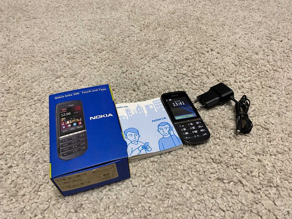 Мобільний телефон Nokia Asha 300 Graphite мобильный сенсорный