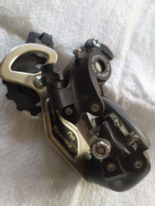 Задний переключатель скоростей, компаньела Shimano.