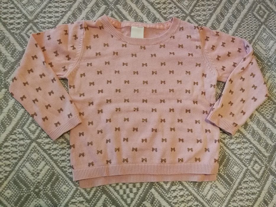 Sweter r92 różowy w złote kokardki