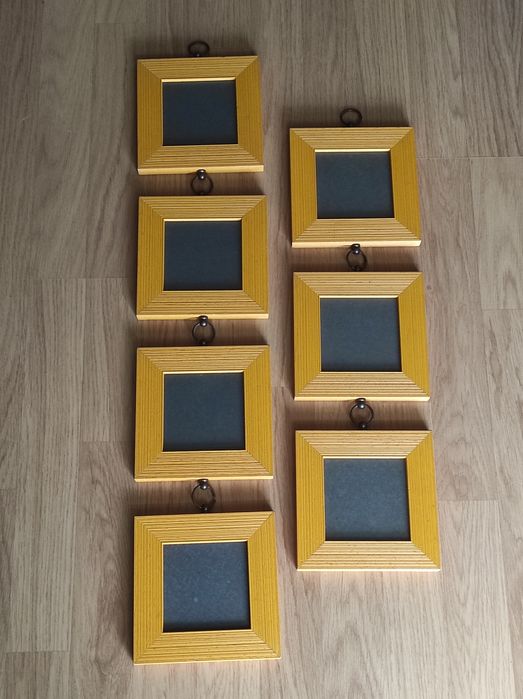 Molduras de parede em madeira para fotos