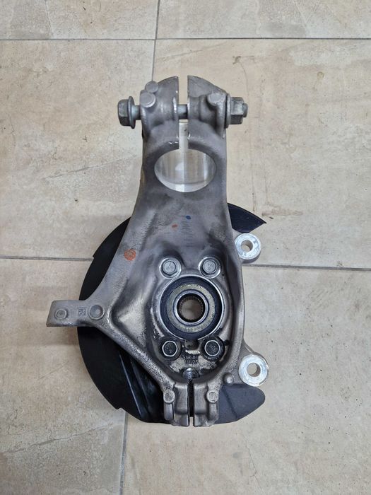 Цапфа передняя левая кулак поворотный Nissan Rogue 1.5 2021 2022 2023+