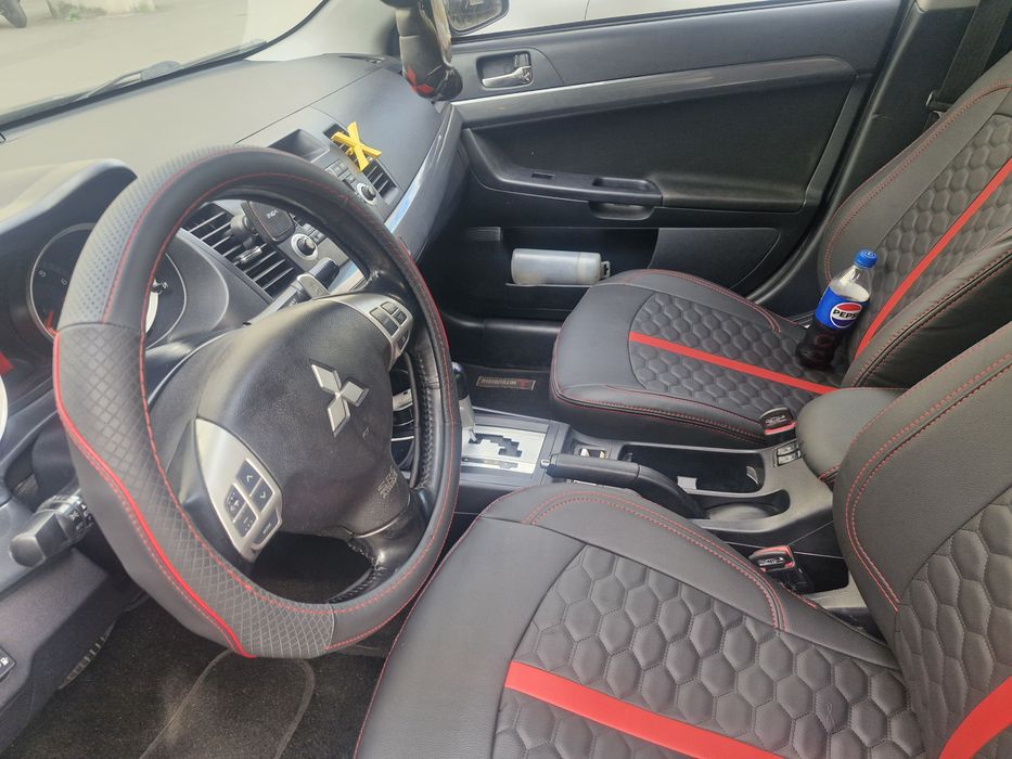 Митсубиши Лансер Х