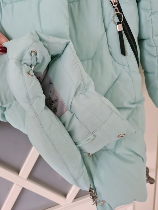 Пуховик в ідеальному станні