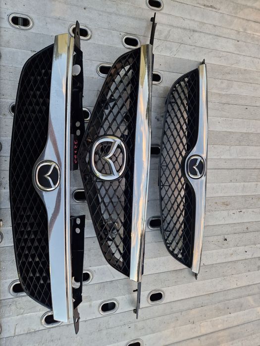 Grill Atrapa Mazda 323f BJ Premacy 622