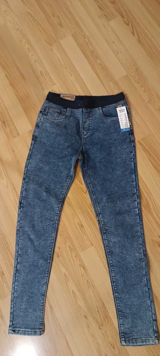 Sprzedam nowe spodnie jeansowe 164 r. dla hłopaka