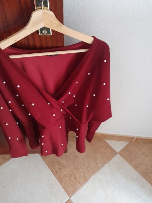 Blusa com pérolas