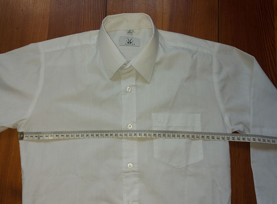 Biała koszula dla chłopca