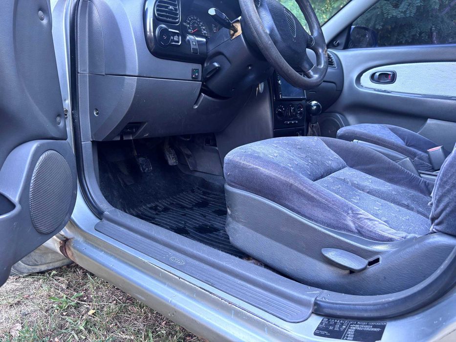 Kia Sephia 2003, Газ/Бензин