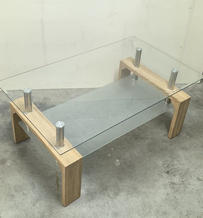 Belíssima mesa de centro Missouri Cambrian, pé em madeira e vidro.
Ler