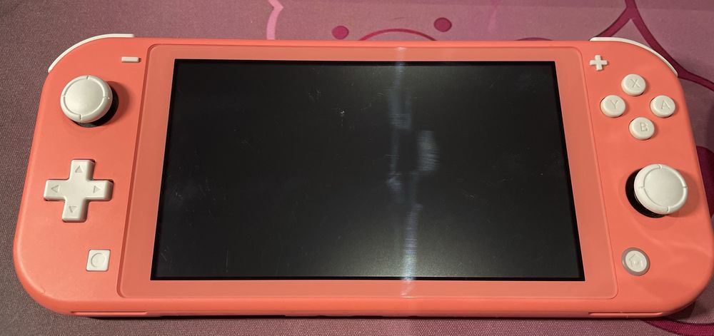 Nintendo Switch Lite рожевий + багато ігор