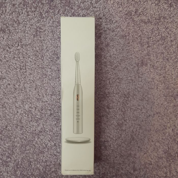 Німецька електрична зубна щітка + 4 насадки