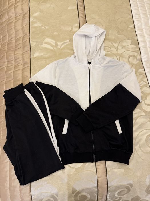 Dres chłopięcy biało-czarny 160 cm