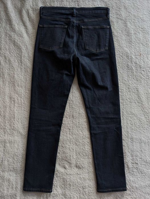 Granatowe spodnie jeansowe jeansy Uniqlo ok. 34 - 36