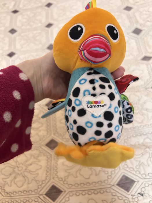 Іграшка на коляску