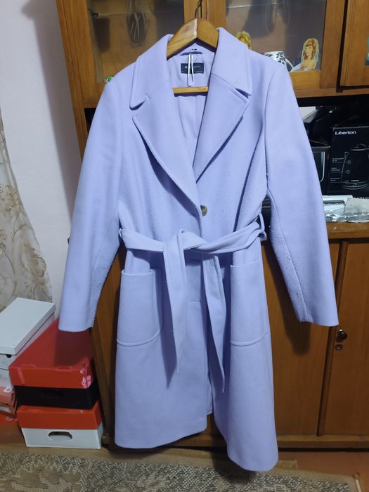 Жіноче драпове пальто