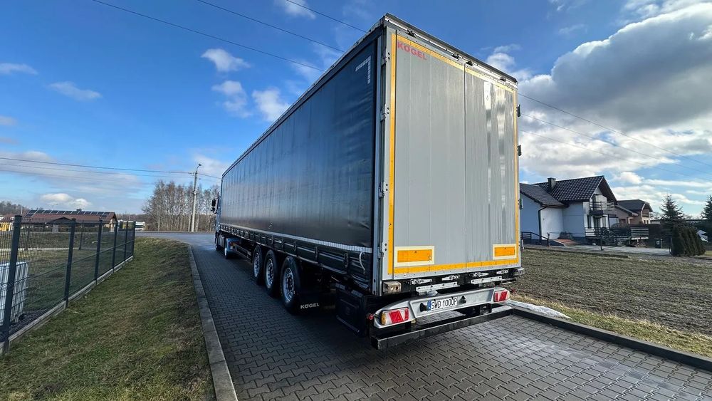 Kögel SN 24 Coil Mulda Platforma kłonice sztyce  Naczepa Kogel SN 24 z 2015 roku Coil Mulda