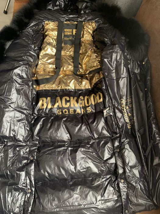 Plaszcz puchowy z kapturem obszytym lisem naturalnym