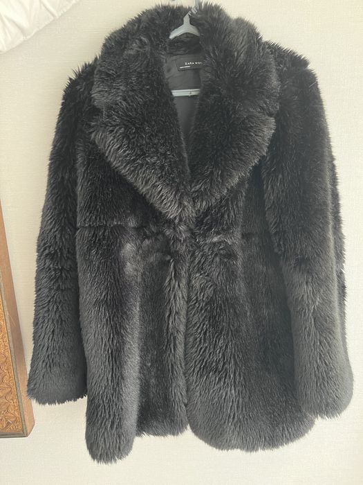 Casaco de pelo preto