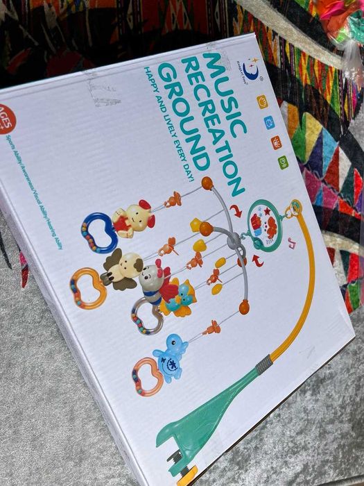 Мобіль музичний у дитяче ліжко