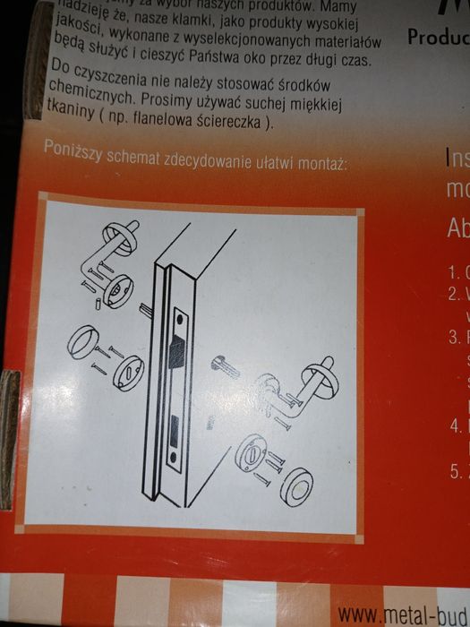 Klamka drzwiowa  z okrągłym szyldem