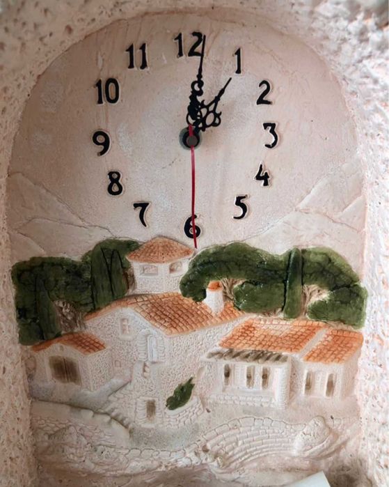 Relógio em pedra c/ luz de presença