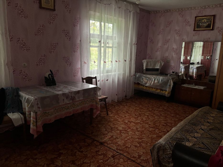 Продам цегляний будинок із земельною ділянкою 25 сот