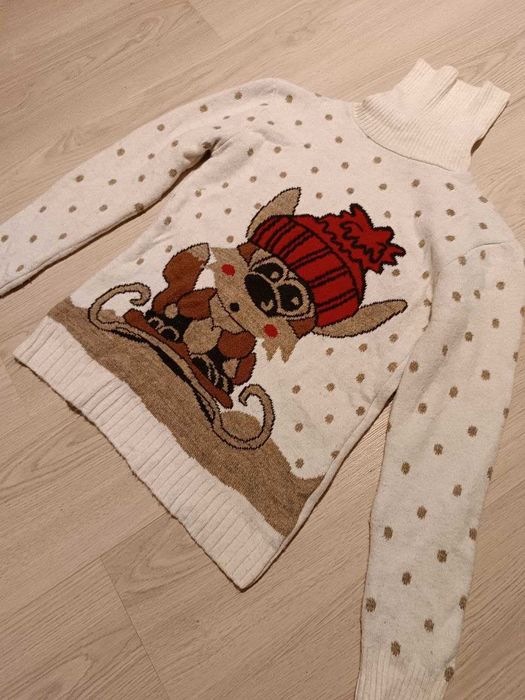 różne ciepłe swetry