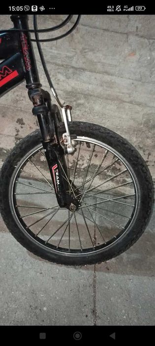 Bicicleta com suspensão "TEAM"