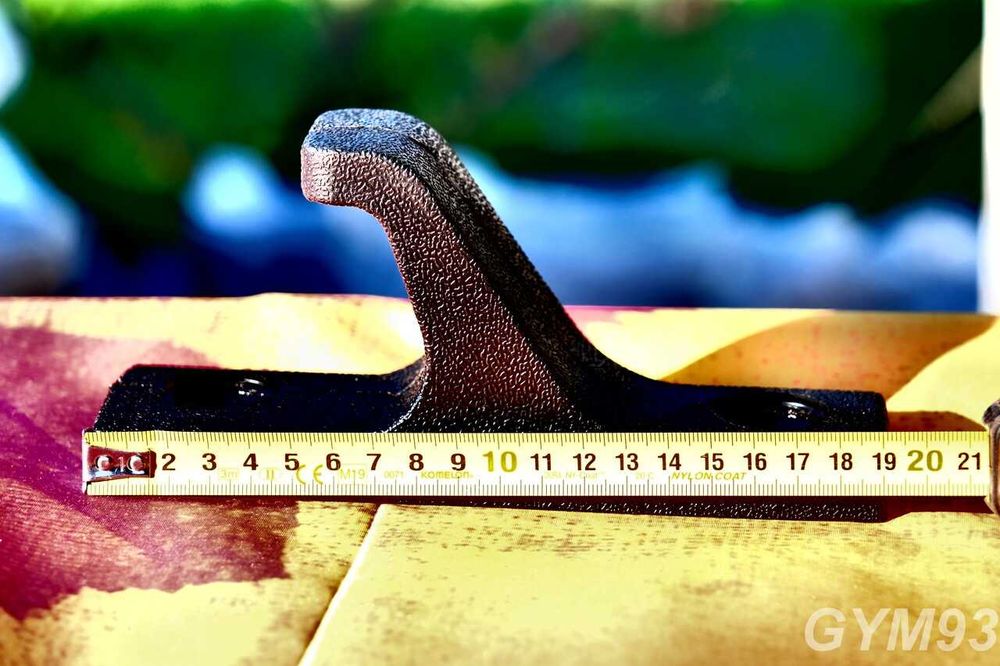 Uchwyt pod sztangę mocowany w dowolne miejsce klatki riga ławy half