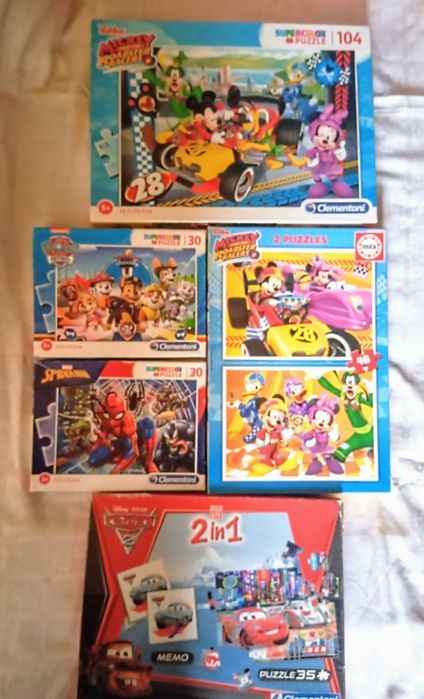 Lote de 16 puzzles e jogos.20€ tudo.