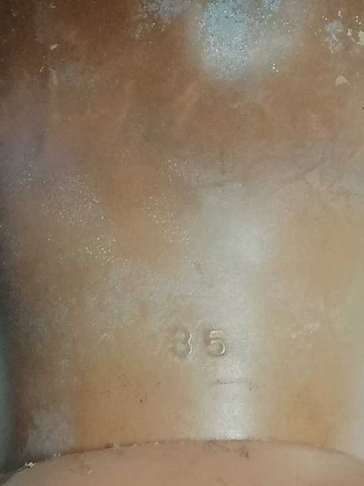 boneco antigo que mexe a cabeça quando se movimenta os braços