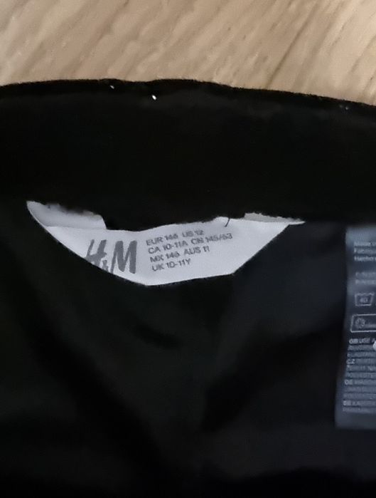 Legginsy H&M rozm. 146 czarne połyskujące z gwizdkami