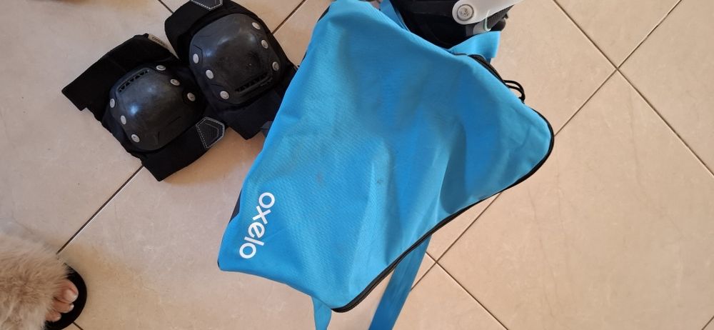 Роліки ,захисна амуніція ,рюкзак