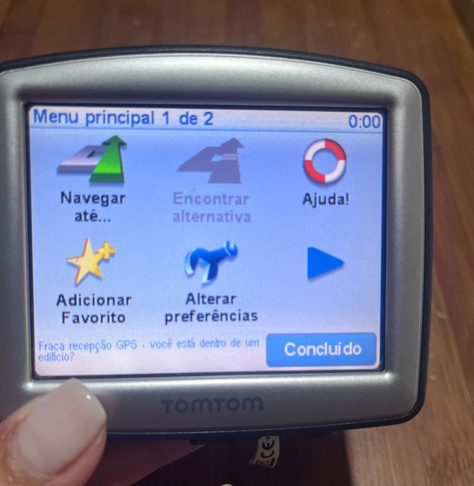 GPS tomtom e máquina fotográfica