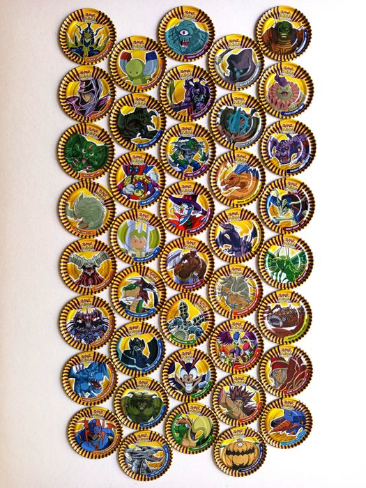 40 Mega tazos em metal da série Yu Gi Oh! em estado NOVOS
Disponho dos númer