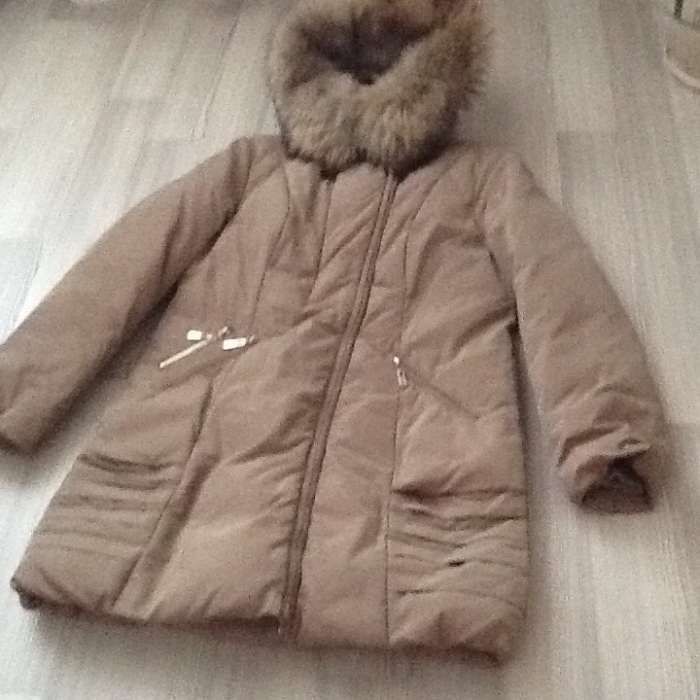 Продаётся женский пуховик горчичного цвета с капюшоном