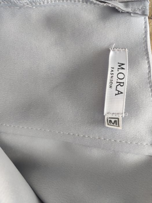 Ніжна святкова блакитна сукня розмір М